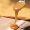 pure new zealand honey on spoon