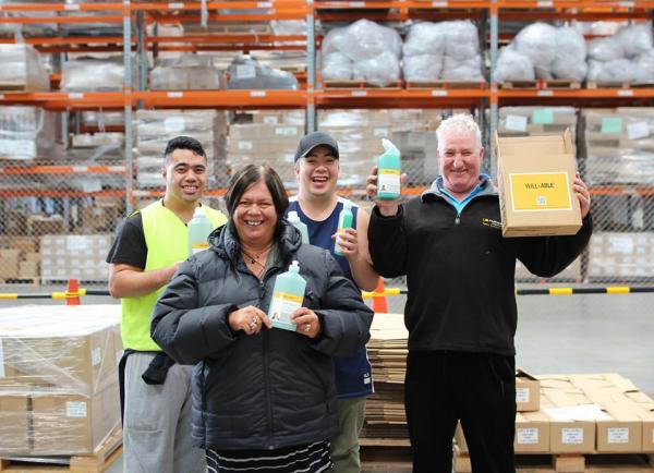 Will and Able employees with product